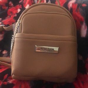 Reaction Kenneth Cole small backpack purse in tan.